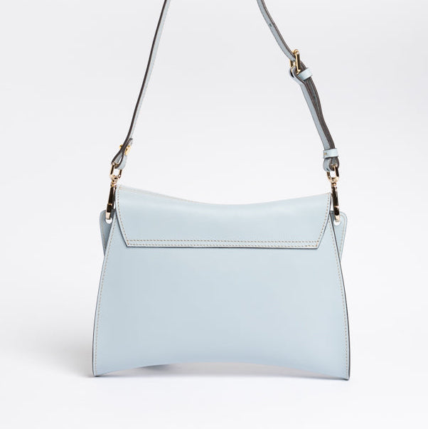 Back view of Trooper Shoulder Bag in aquamarine leather by Freedman Harness – structured silhouette with clean lines, top flap detail, and gold hardware