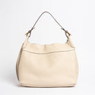 Back view of Wetherby Tote by Freedman Harness – putty leather shoulder bag with curved top edge, single strap, and soft structured silhouette