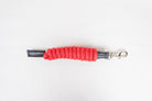 Freedman Harness red paracord poly lead rope with premium black leather accents and a stainless steel snap on a white background.