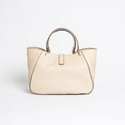 Back view of Midi Cabriolet Bag by Freedman Harness – beige leather handbag with curved structure, gold-tone hardware, and double handles