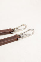 Close-up of Snap on ACTraining Snap Bridle Replacement Cheek, Brown Leather with Silver Hardware
