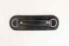 Close-up of Leather Harness Band with Copper Rivet

