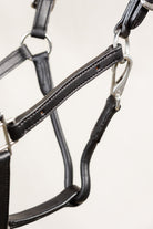 Close-up of a 3/4 inch Cob Halter with Rolled Nose and Padded Crown, showing a metal snap and leather details