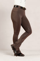 After Dark Brown Jods with the  Patent Scalloped Spur Belt and Pisgah Jodhpur Boot on a white background.