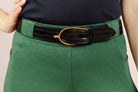 Green Cheetah Jods with the Patent Scalloped Spur Belt featuring a brass buckle on a white background, made by Freedman’s Harness.