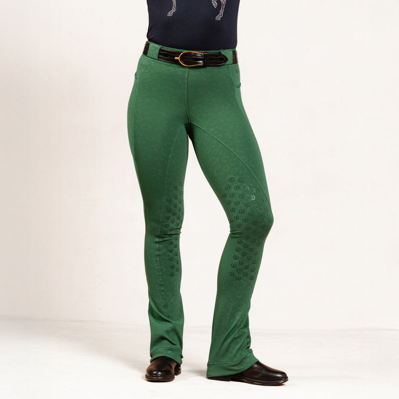 Green Cheetah Jods by Freedman’s Harness featuring a patterned “F” logo leg design on a white background.