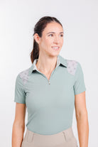 Freedman's Ladies' 1/4 Zip Polo, light green with patterned shoulder details.