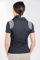 Back view of Freedman's Ladies' 1/4 Zip Polo, black with patterned shoulder details.