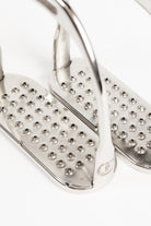 Close-up of Freedman's Logo Hunter Stirrup Irons, showing permanent pick stainless steel treads and brand logo detail.