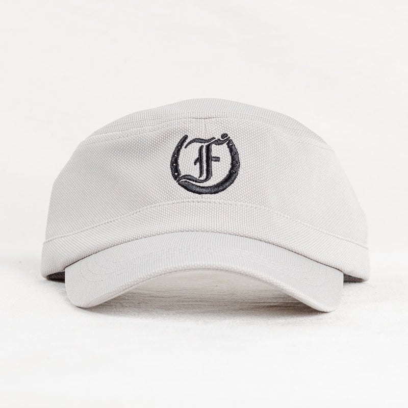 White cap with black Freedman Horseshoe Embroidered logo on a white background