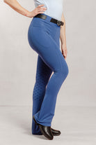 Women wearing stiffkey blue Jod with a plain background