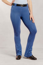 Stiffkey Blue Jod with a patterned Freedman "F" design and black belt with silver Freedman Logo buckle on a plain background