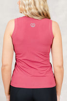 Pink Laser tank top with Freedman's "F" logo on the back, worn against a neutral background