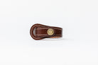Brown leather Signature Leather Bracelet by Freedman's with brass logo button and white stitching, displayed on a white background.