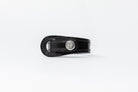 Black leather Signature Leather Bracelet by Freedman's with silverlogo button and white stitching, displayed on a white background