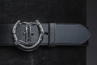 Close up of Freedman's Signature Logo Belt: Black Leather Belt with Silver Horseshoe Buckle and Embossed Brand Logo