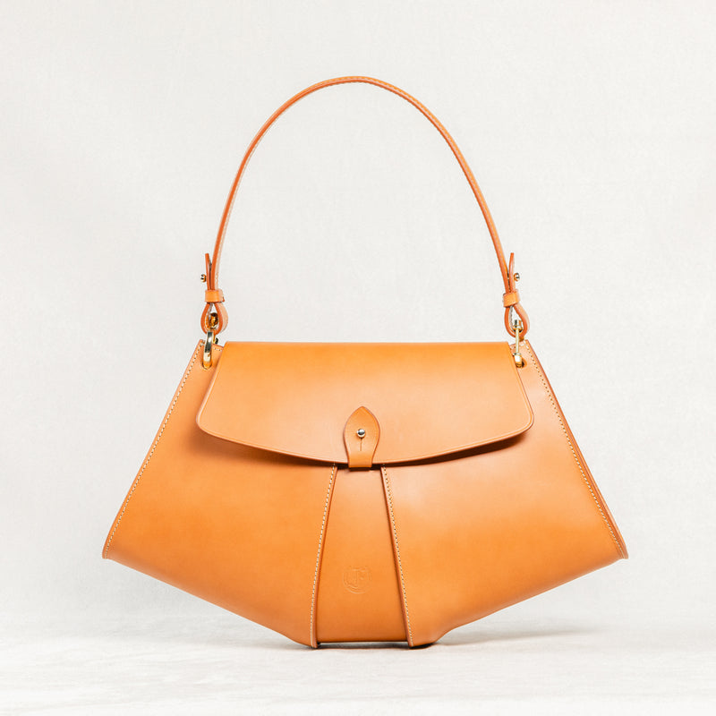 Cognac leather Moray Bag by Freedman's with unique trapezoid silhouette and long shoulder strap.