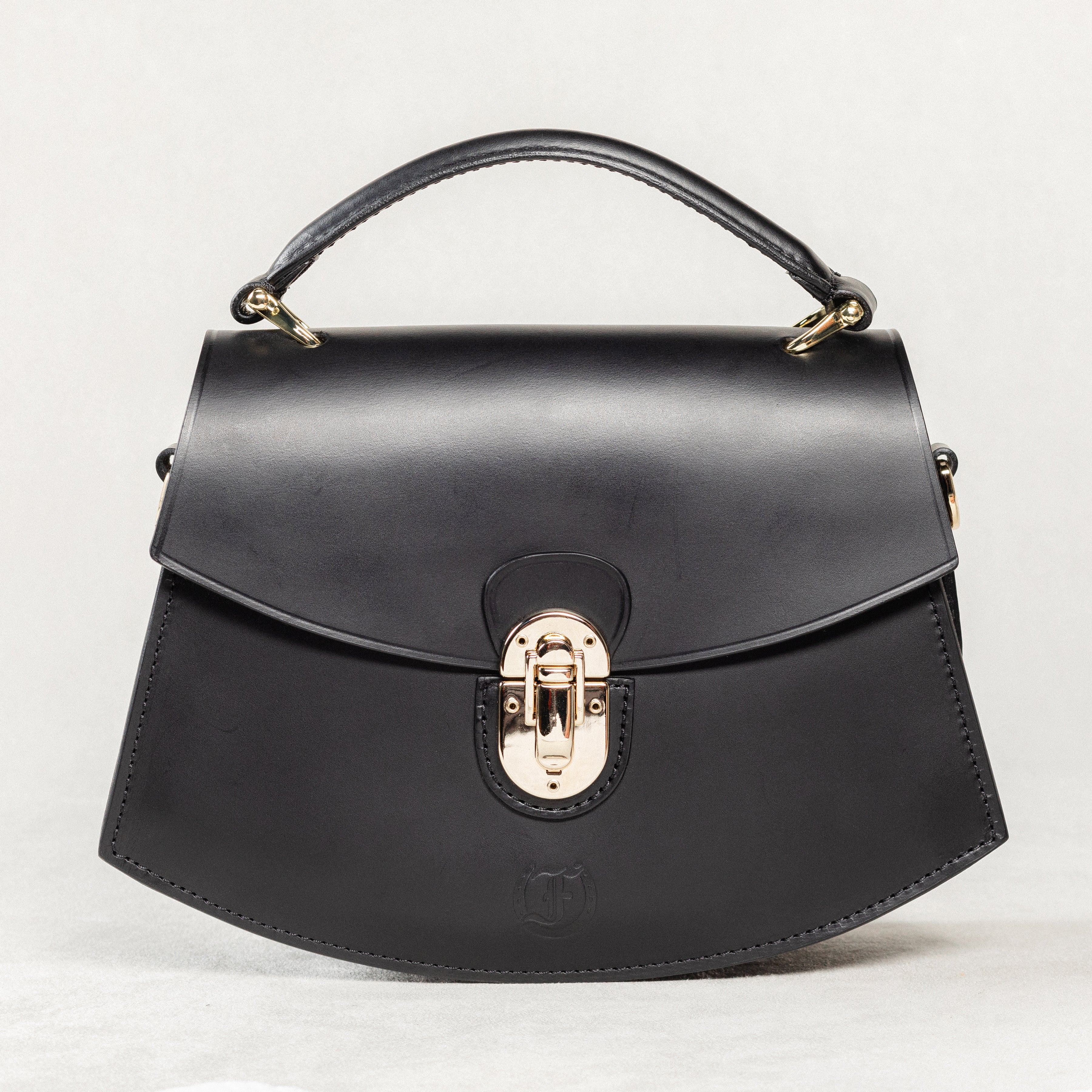  Black leather Minibus Bag by Freedman's with structured top handle and gold-tone hardware.