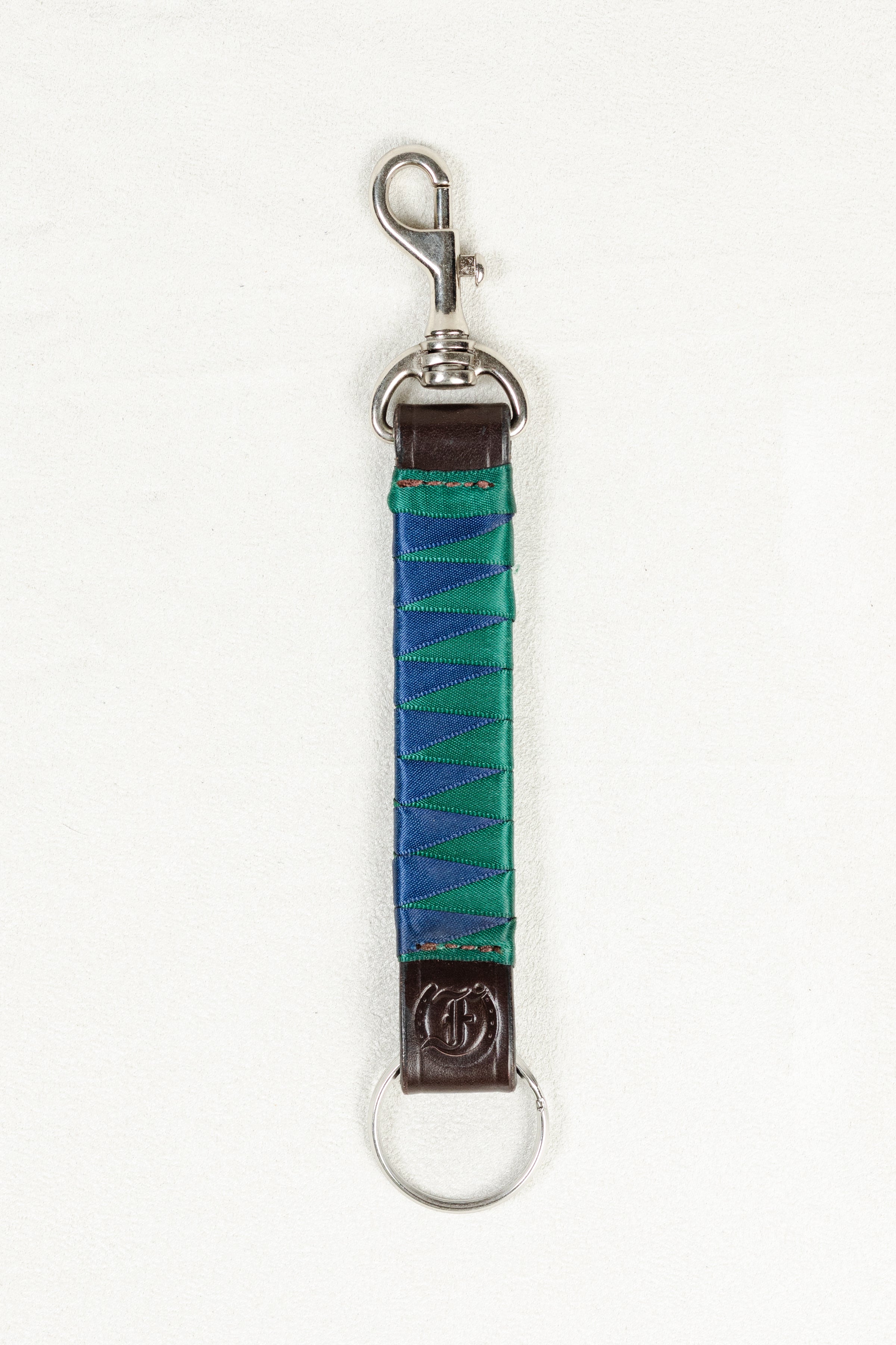 Blue and Green satin-finished keychain in dark Havana brown bridle leather with stainless steel clasp and Freedman’s F logo on a white background.