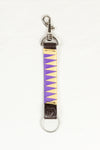 Purple and Yellow satin-finished keychain in dark Havana brown bridle leather with stainless steel clasp and Freedman’s F logo on a white background.