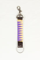 Purple and Yellow satin-finished keychain in dark Havana brown bridle leather with stainless steel clasp and Freedman’s F logo on a white background.