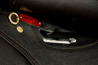 Close-up of Hunter SG saddle hardware and branding.