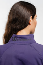 Back View of Model Wearing purple Freedman's Ladies Arum Jacket and Freedman's Print Collar, showcasing athletic fit