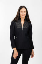 Front View of Ladies Soft Shell Quilted Jacket: Showing Black Fabric, Quilted Panels on Chest and Shoulders, Full Zipper, and Zippered Pockets