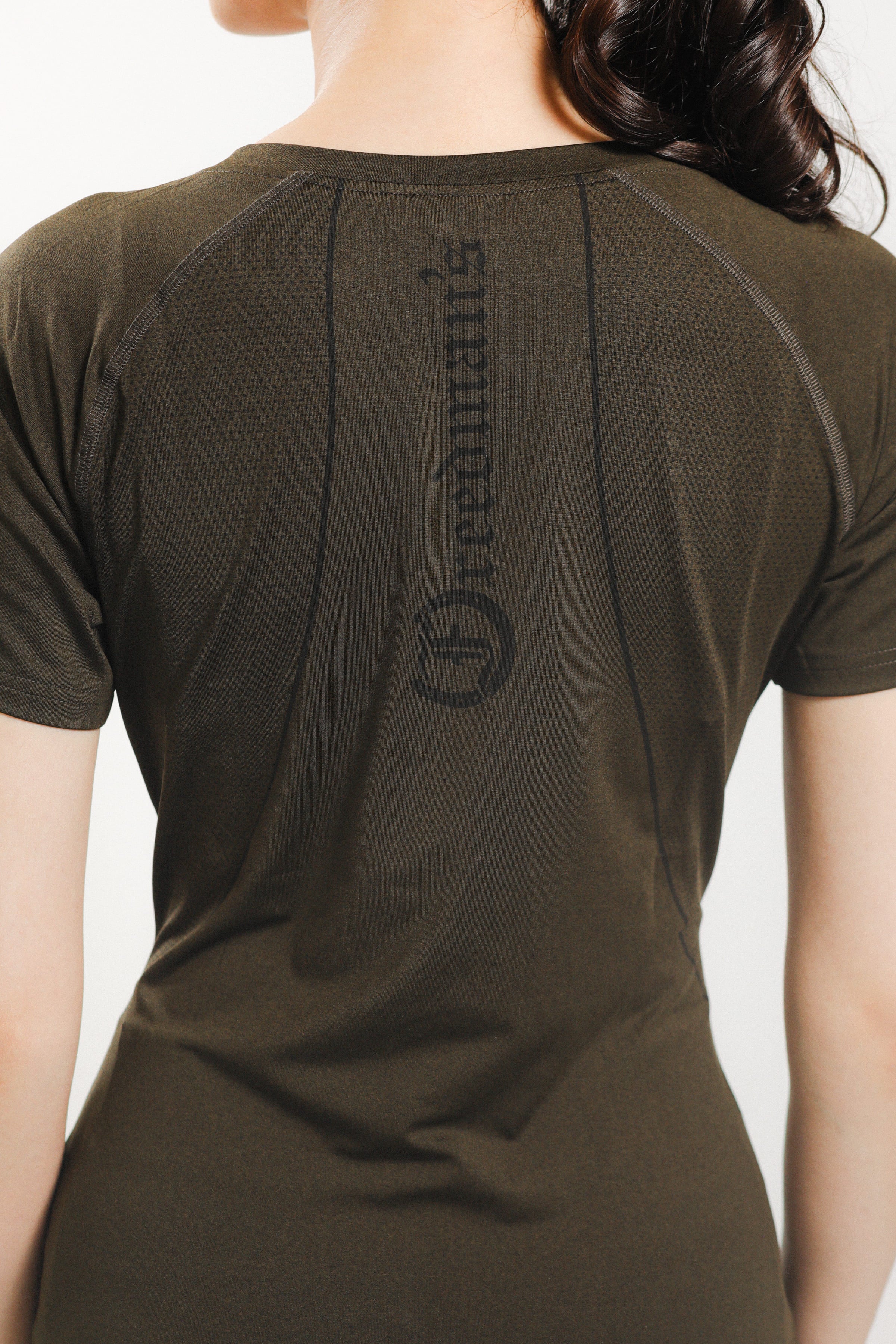 Ladies' tee shirt with "Freedman's" branding on the back.