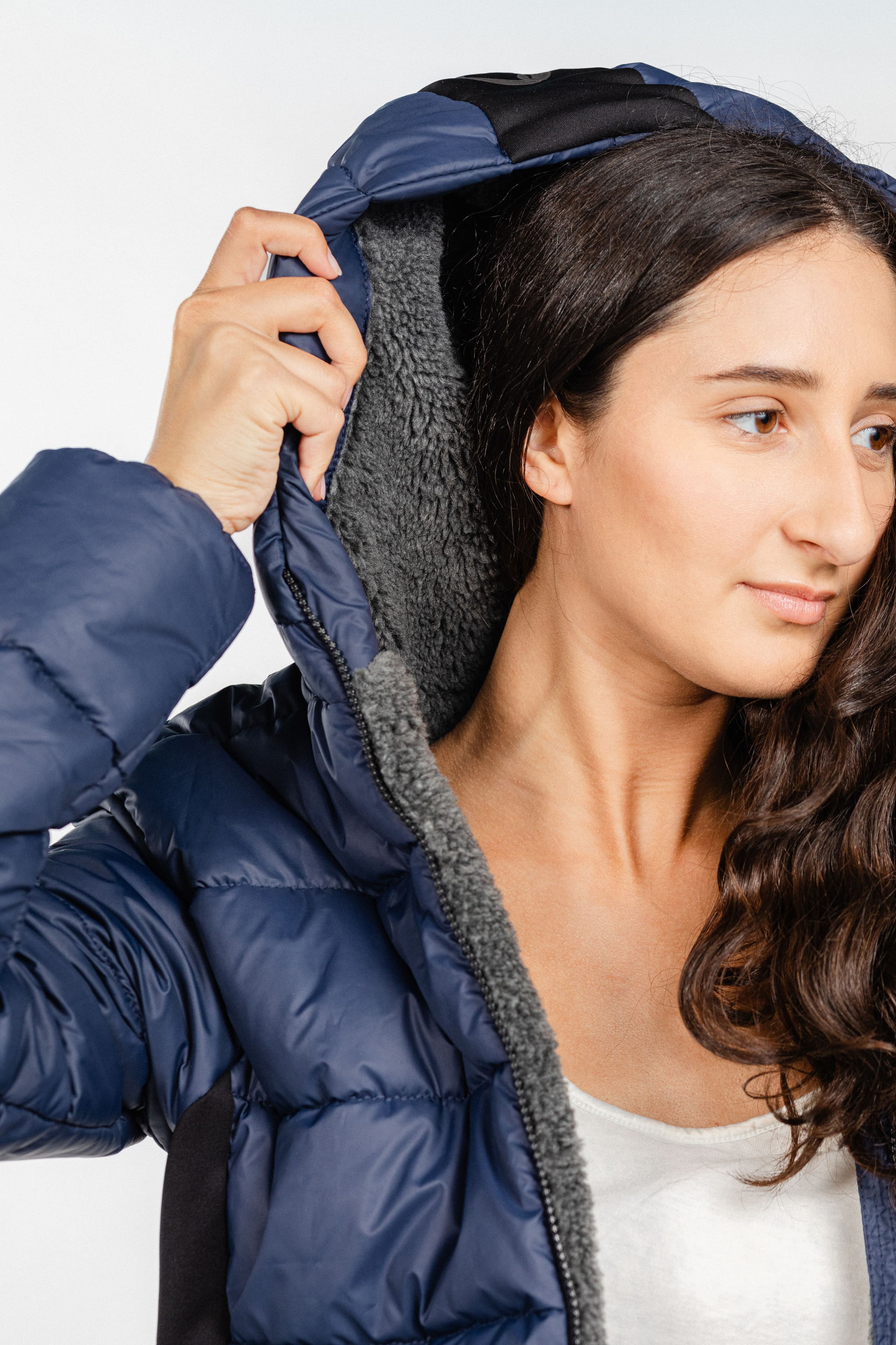 Navy Ladies Winter Bomber Jacket by Freedman's, showing sherpa lining in hood.