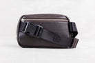 Brown leather crossbody or waist bag with a visible brand logo on white background