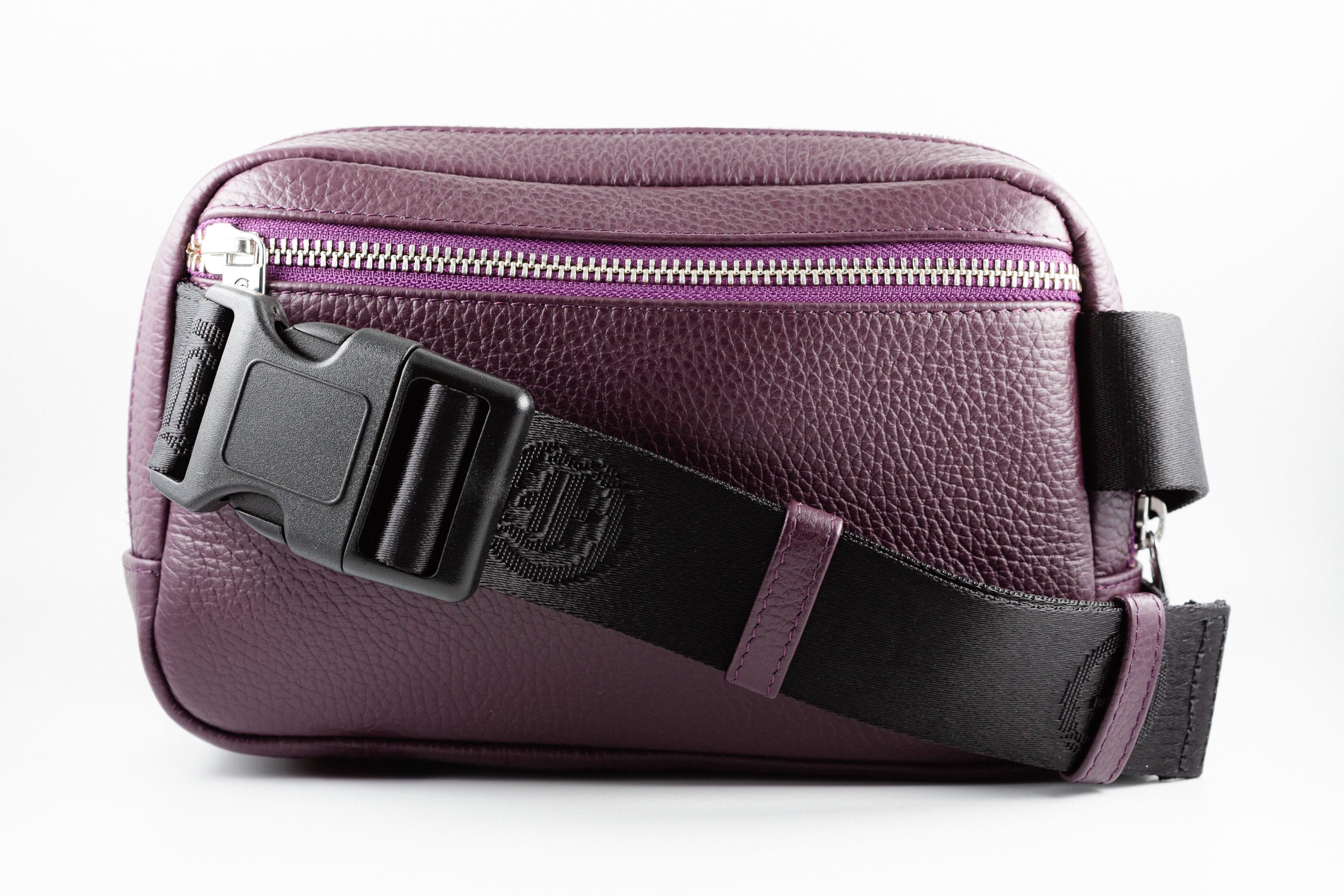 Freedman's Norfolk Crossbody Bag in Purple Leather with adjustable strap and silver zipper.