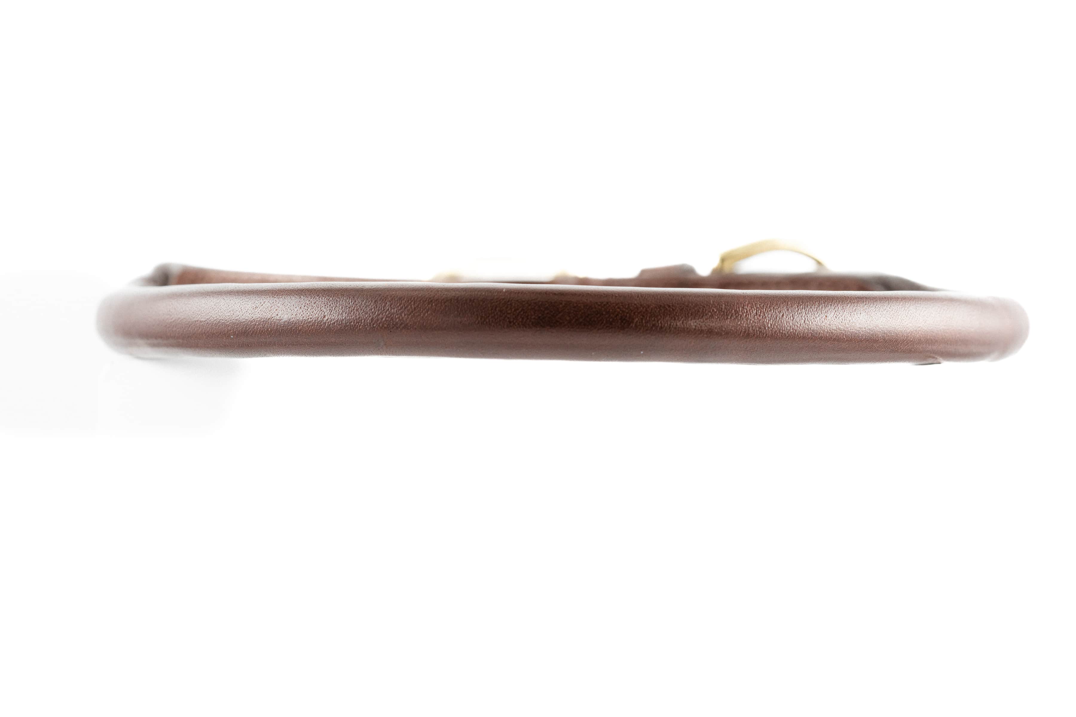 Side view of brown leather Round Dog Collar by Freedman's, showing rolled edge construction on white background.