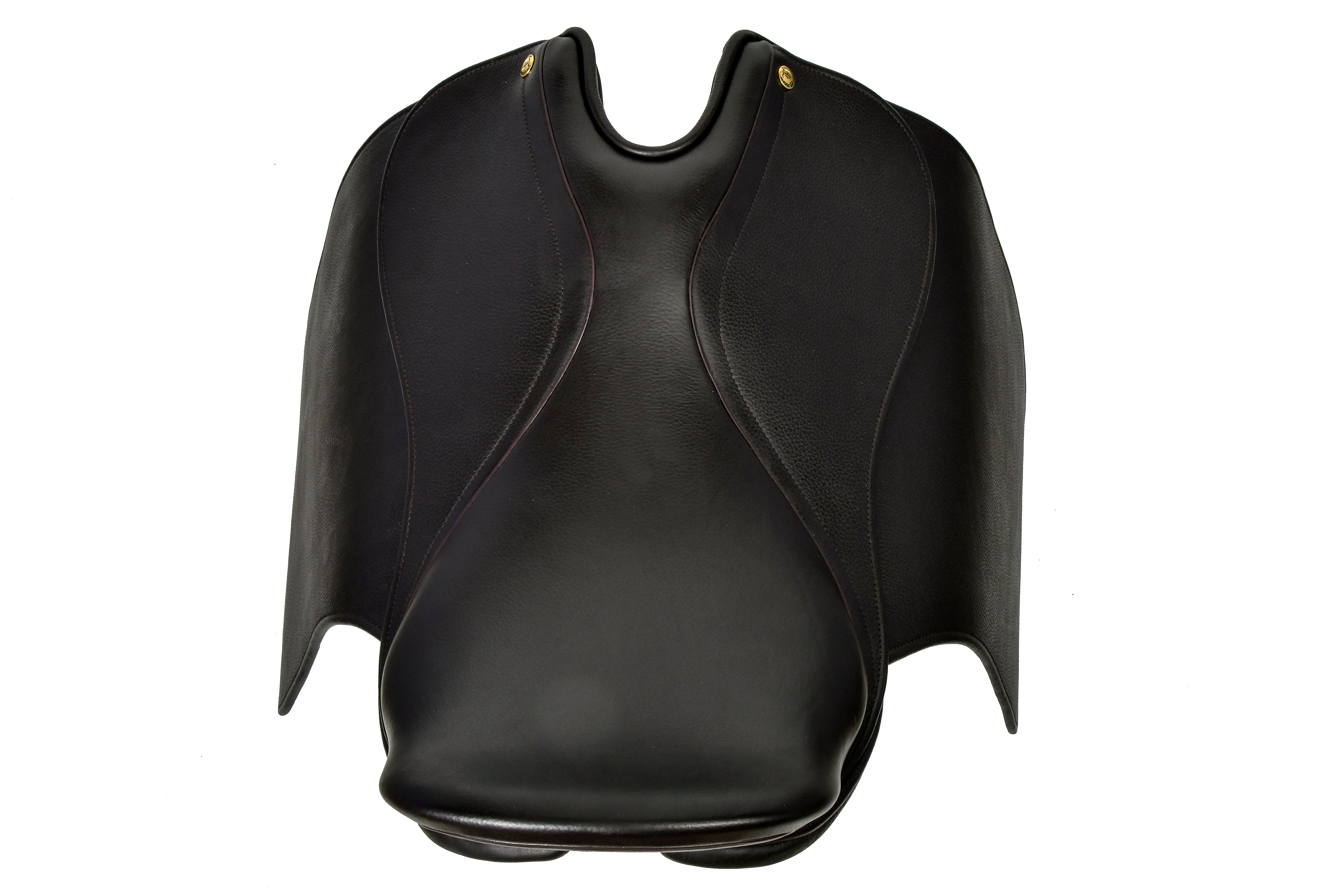 Overhead view of a black leather Victory Pass HP Cutback Saddle, highlighting its distinctive cutback design for enhanced shoulder freedom and rider comfort, set against a clean white background