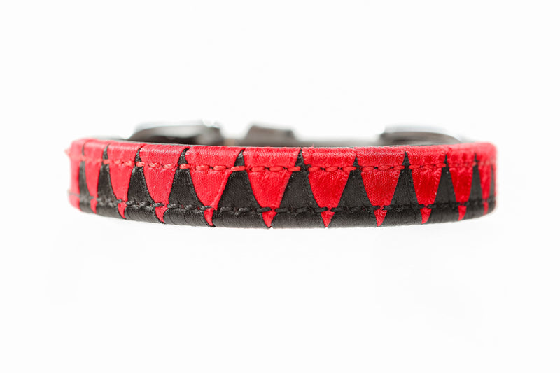 Close-up of Satin Red and Black Weaved Dog Collar, showing detailed triangular pattern on white background.