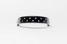 Wide Tapered turned edge browband, black patent, small white dots, brown ends.