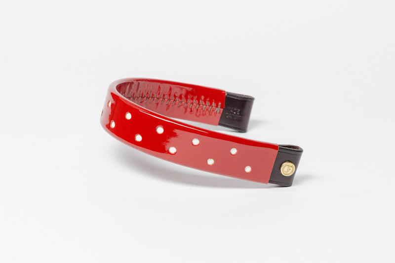 Wide Tapered turned edge browband, red patent, small white dots, brown ends.