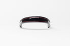 Black and red insert patent leather browband, wide tapered design, turned edge, frontal view showing curved shape.