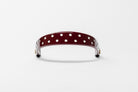 Burgundy Patent Leather Browband with white dots, wide tapered design, dark leather ends, frontal view.
