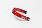 Red Patent Leather Browband with white dots, wide tapered design, polished brass Freedman logo buttons, and dark leather ends.
