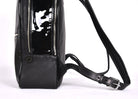 Black leather backpack, The Jaunty by Freedman's, lower view with adjustable strap, patent leather accent, and zipper detail.