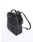 Black leather backpack, The Jaunty by Freedman's, angled perspective with patent leather accent, logo, zippers, and shoulder straps.