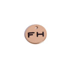 Round Tag with "FH" lettering, brass 
finish, displayed on a white background.


