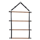 Three-tiered Blanket Rack made of solid oak, black stained leather and brass buckles and rings on a white background.