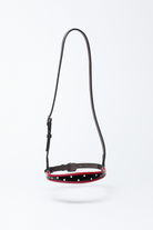 Freedman's Tapered Show Caveson, black/red leather with turned edge and white dots.