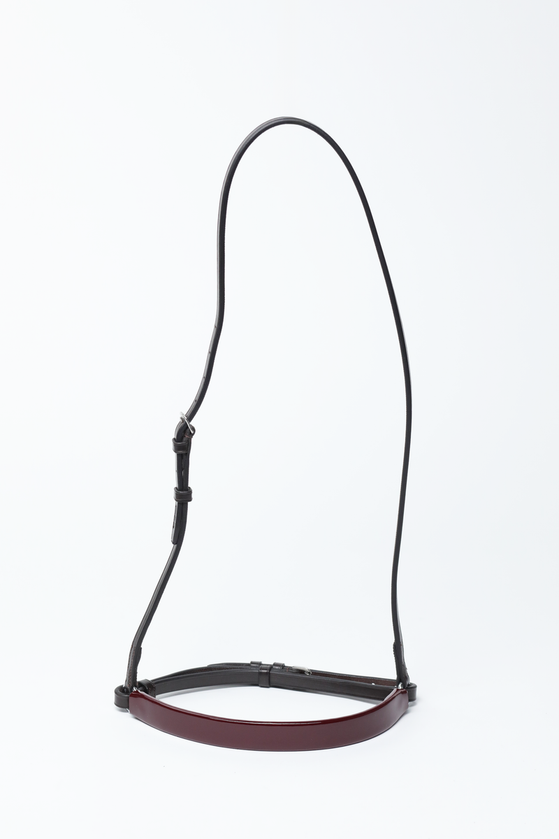 Black leather Show Cavesons with burgundy patent leather noseband and silver hardware, displayed on a white background.