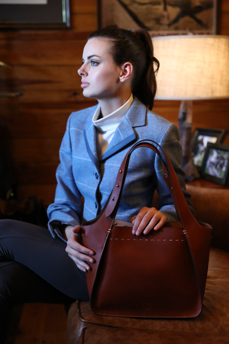 Catalonian Bag by Freedman's: Worn by a Woman in a Professional Setting, Highlighting its Versatility and Style