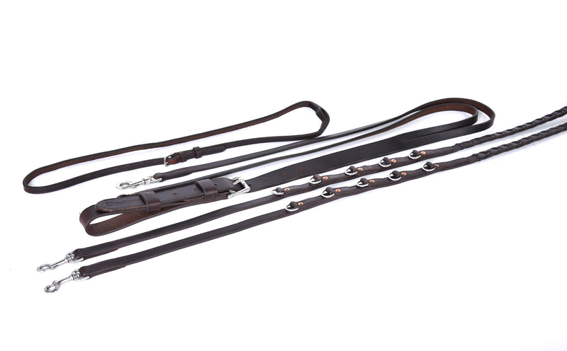 ACTraining 5 Position German Martingale, designed for training horses, made of brown leather with multiple adjustment points, brass hardware, and a braided section, laid flat on a white background.