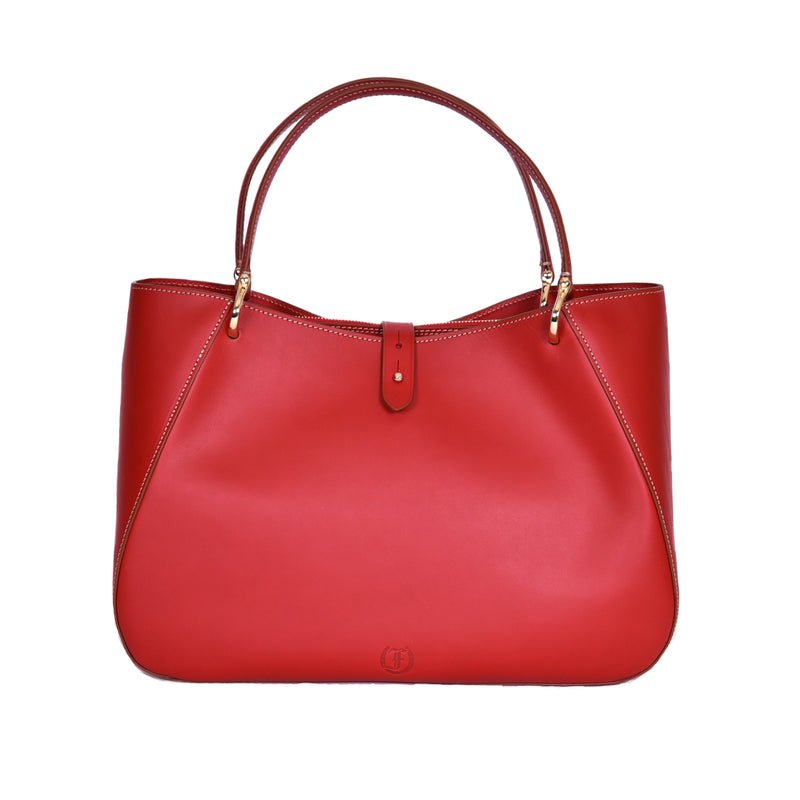 Freedman's Cabriolet Bag: Red leather tote with unique curved design, inspired by the elegance of Cabriolet carriages.