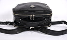 Black leather backpack, The Jaunty by Freedman's, rear view with dual zippers, patent leather accent, and adjustable shoulder straps.